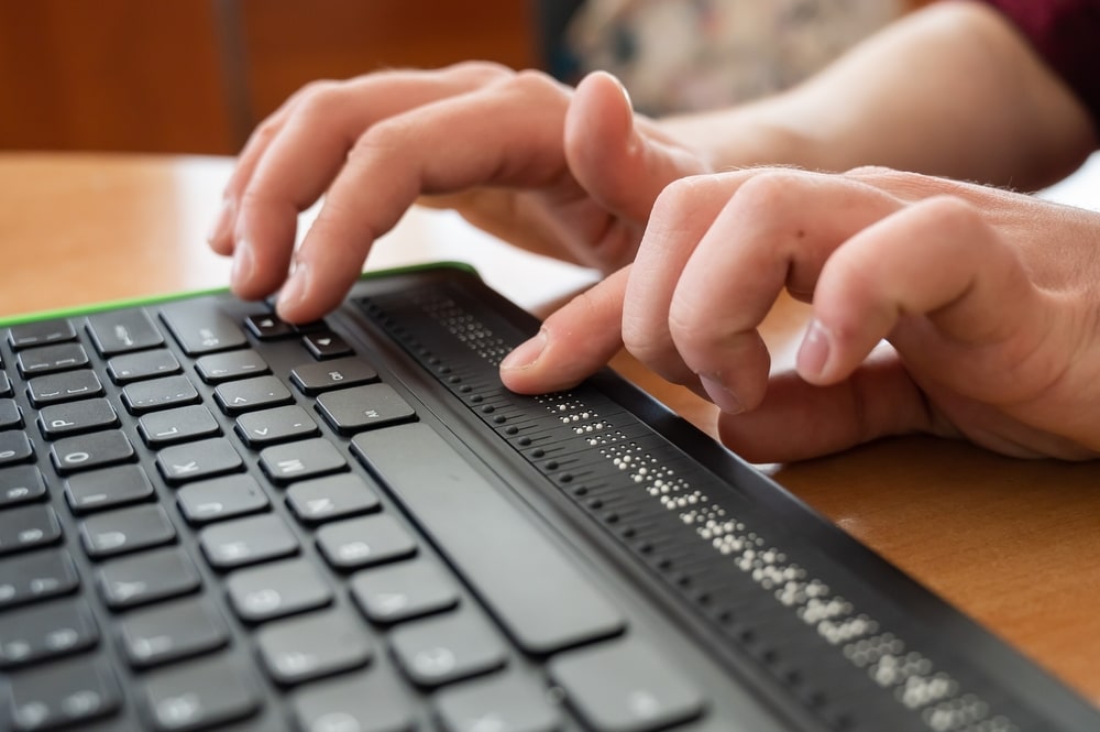 Person Typing Something On A Keyboard