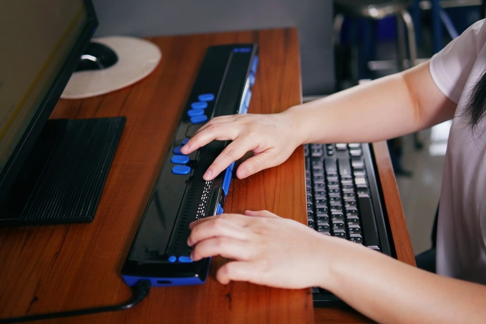 Person Doing Some Work On A Keyboard