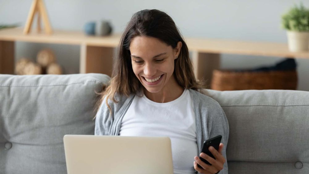 Person using a laptop to access an accessible website