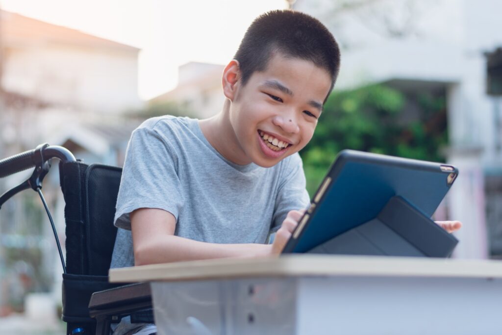 Boy Playing With Tablet