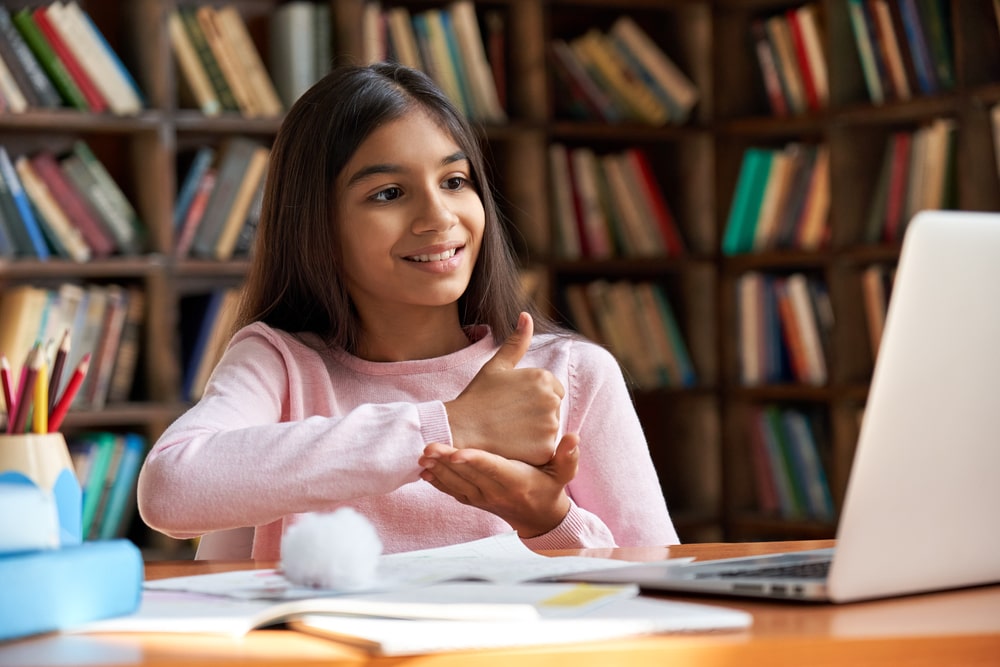 Girl Showing Thumbs Up