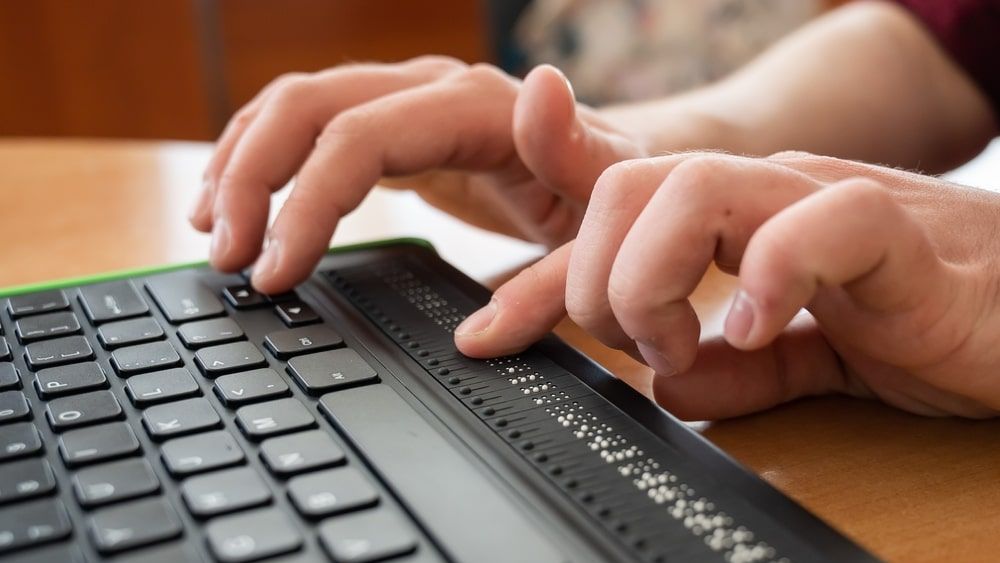 Person Using A Keyboard